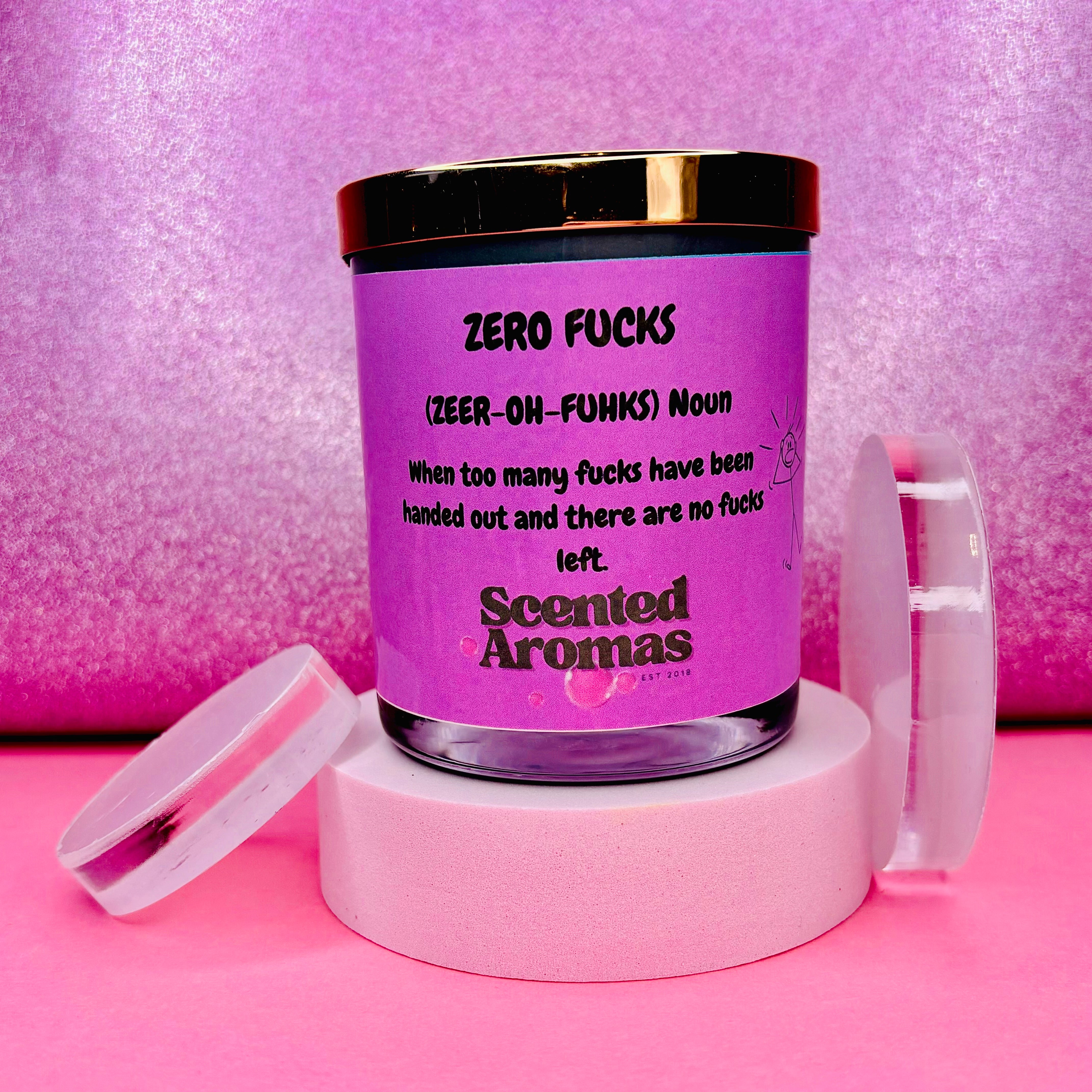 The "Who Cares" Funny Quote Candle 200g by The Soap Gal x, featuring a playful definition label set against a pink and purple background, is an ideal gift candle. Its clear lid adds extra charm to this amusing candle.