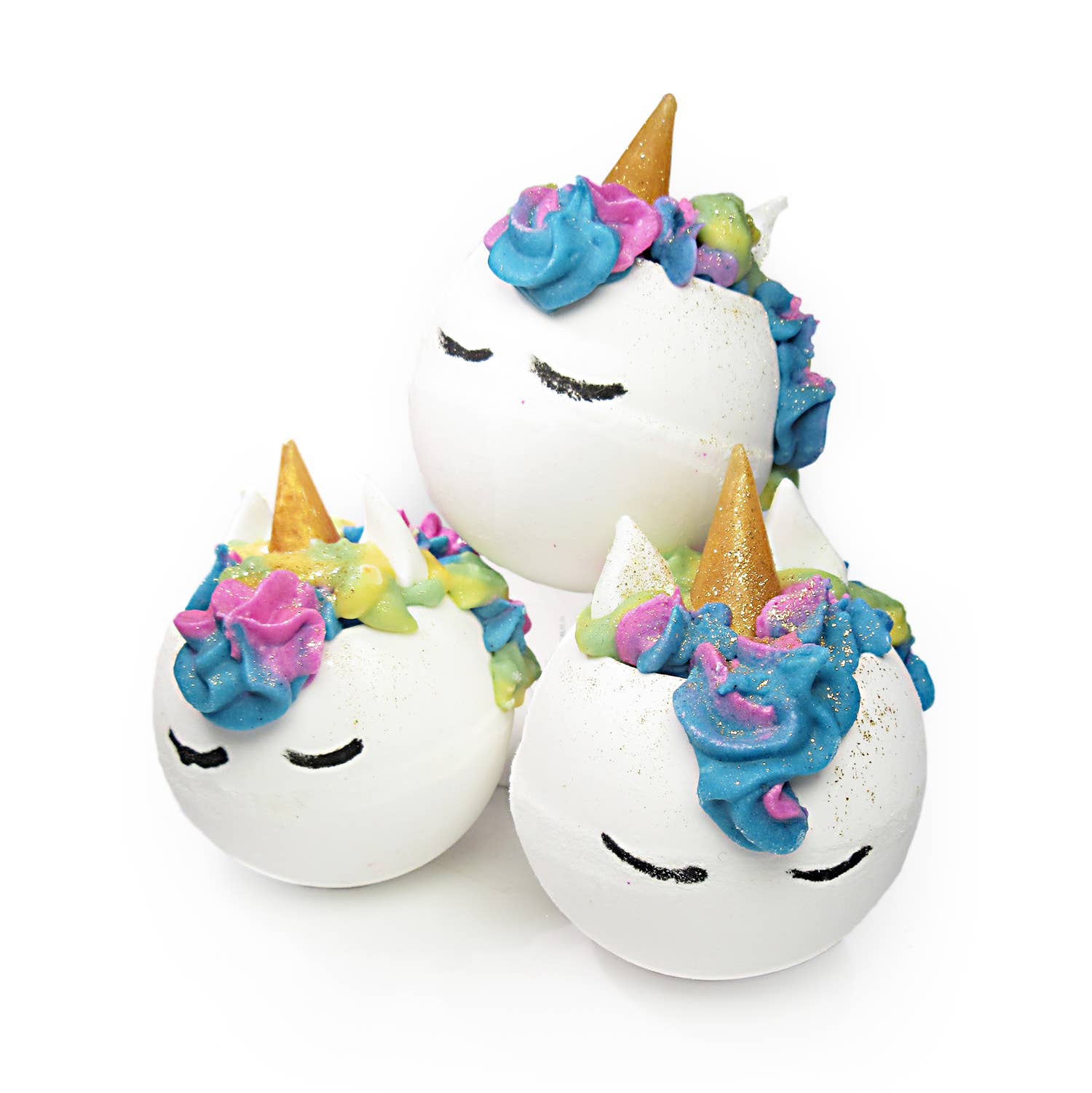 Experience the magical Unicorn Dreams Cocoa Shea Butter Bath Bomb from Scented Aromas, which includes three unicorn-themed bath treats adorned with gold horns and vibrant swirled tops. Infused with shea butter for an indulgent experience, their intricate closed-eyes detailing brings a whimsical elegance to your bathing routine.