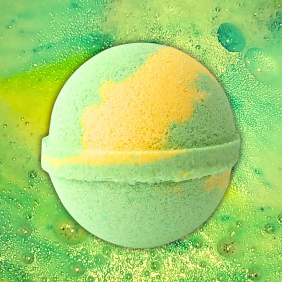 The Soap Gal x's Lime Crush Citrus Bath Bomb is a round bath bomb with an enticing blend of green and yellow colors, dissolving to create bubbles in a greenish-yellow water background. Its moisturizing formula and refreshing citrus scent elevate your bath experience.