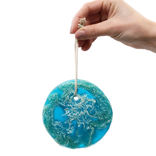 A hand holding a blue and green round Loofah Soap On A Rope by The Soap Gal x.